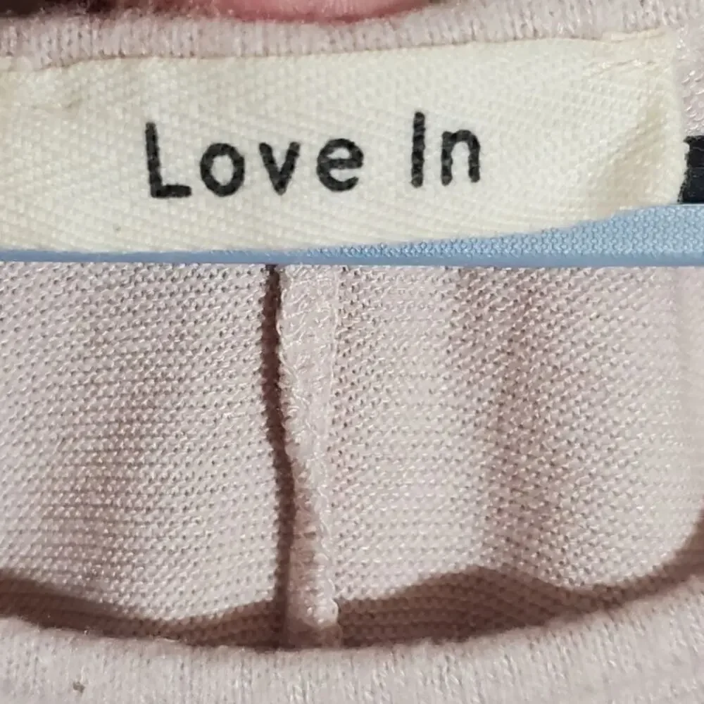 LOVE in super soft pink ruffled sleeve sweater size‎ medium